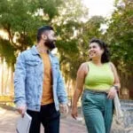 Students walking on campus and chatting