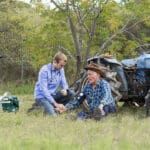 Doctor assessing an elderly patient in a rural setting