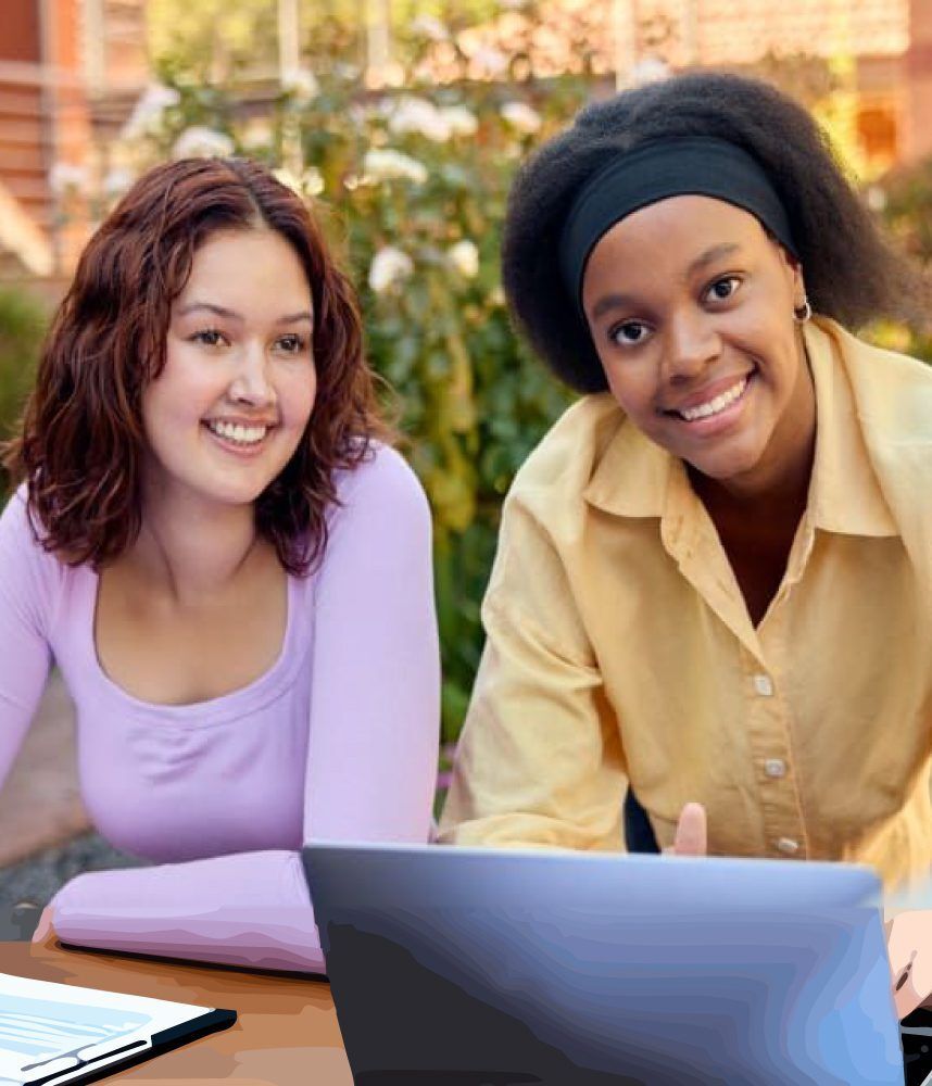 Two students discussing their work.