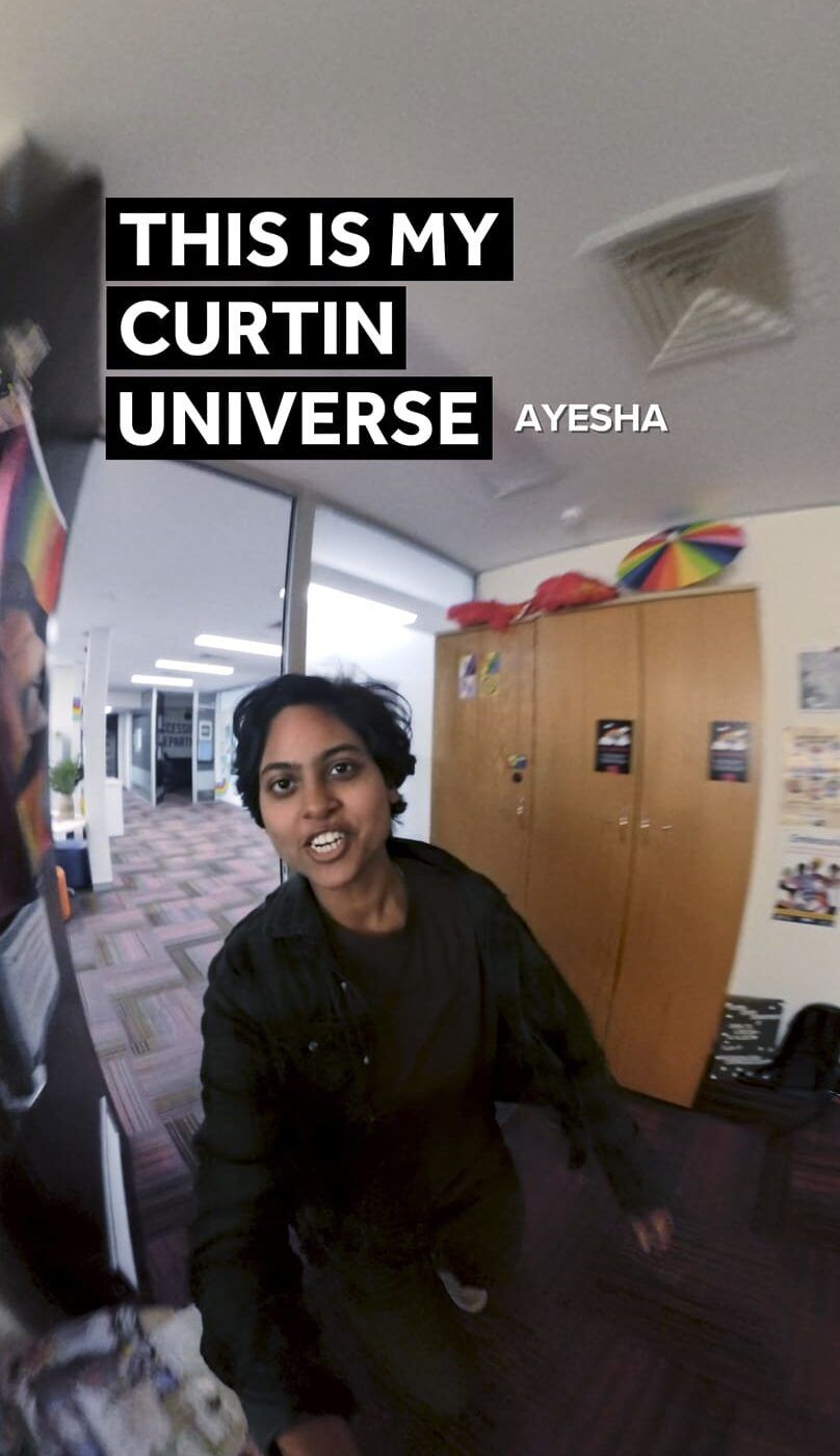student walking into curtin guild queer space