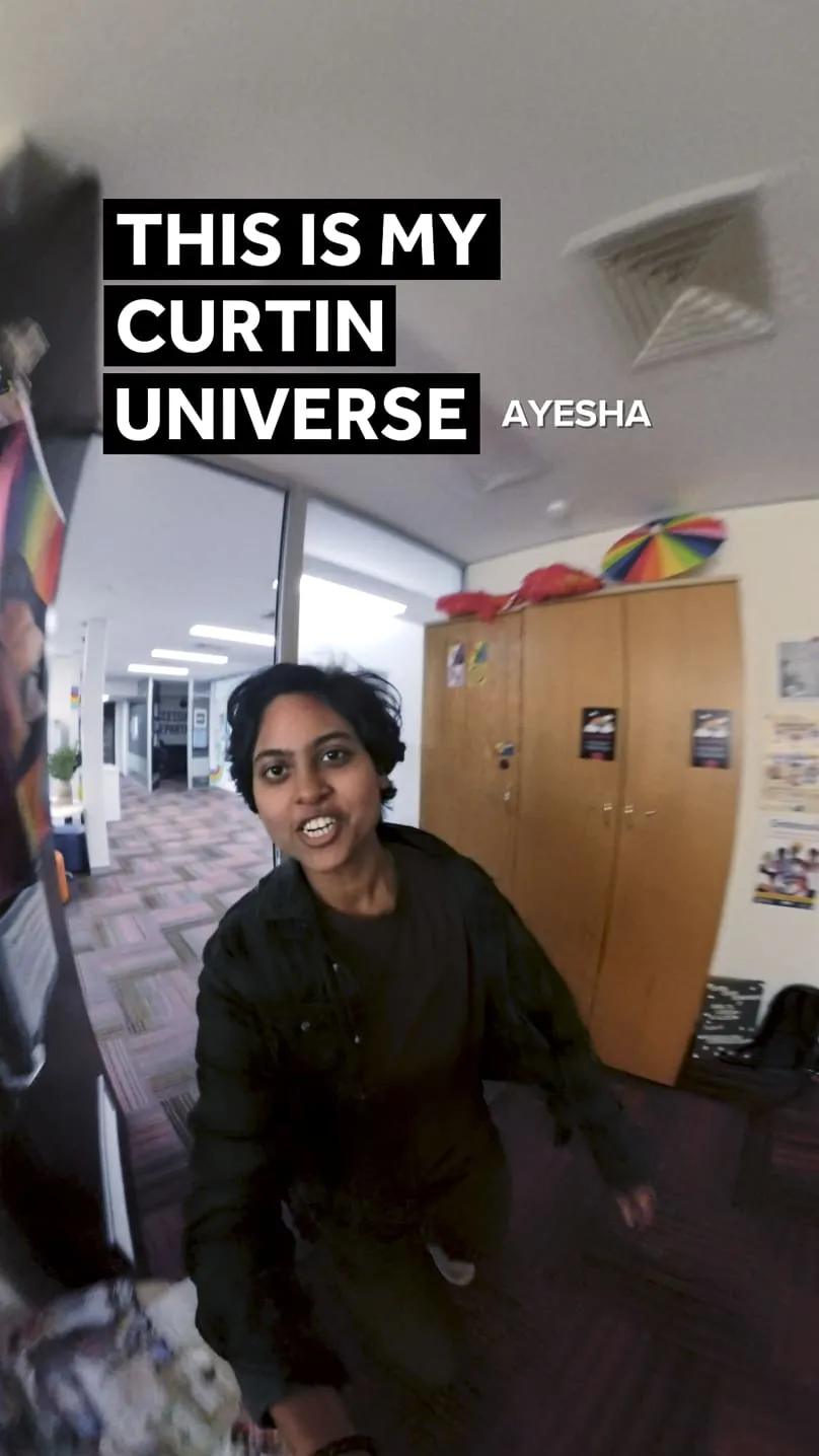 student walking into curtin guild queer space