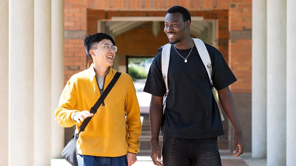 Curtin male students walking