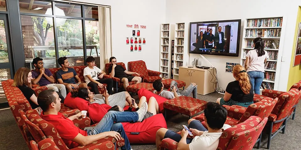 Student s in the living room of Kurrajong Village accommodation