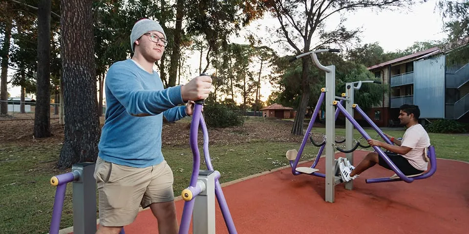 Students exercising outside the Guild House