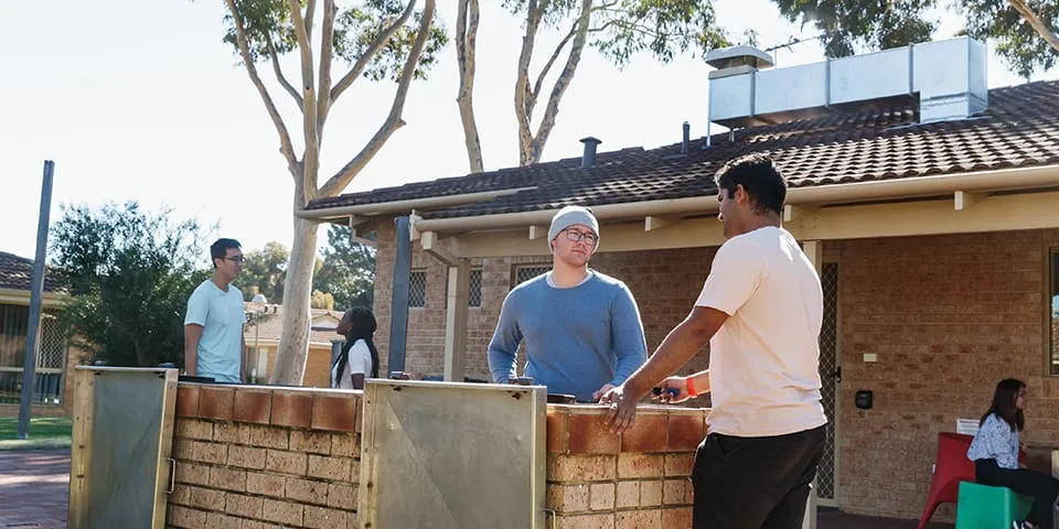 Students enjoying a barbeque at Vickery House