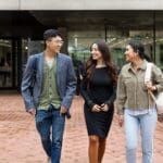 A group of mature age student walking on campus