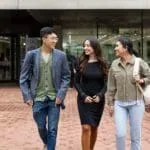 A group of mature age student walking on campus