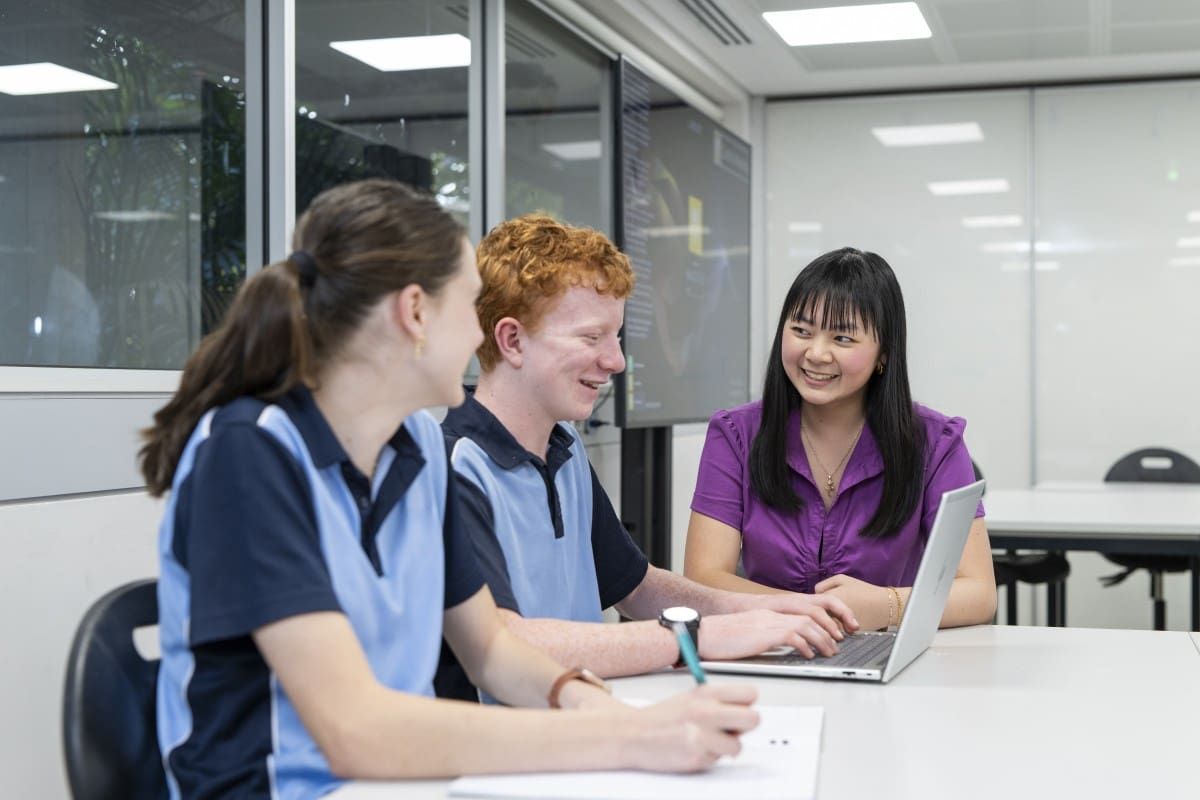 A Curtin Secondary Education student teaching a group of high school-aged children.