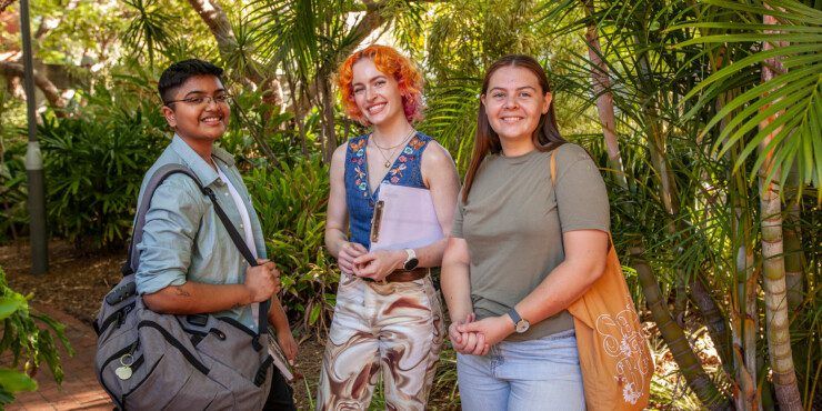 Three female Curtin students standing outside at Curtin's main campus