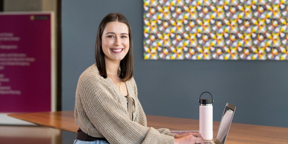 Woman at a desk on a laptop