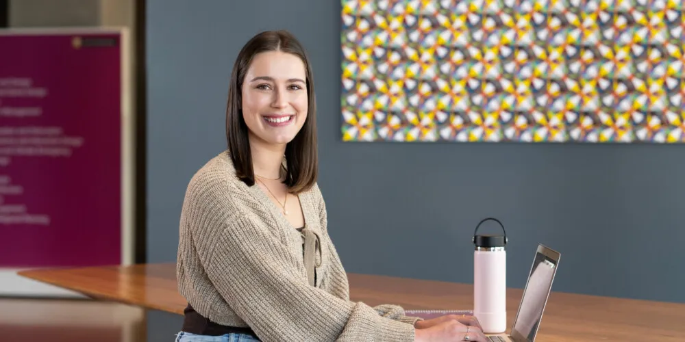Woman at a desk on a laptop